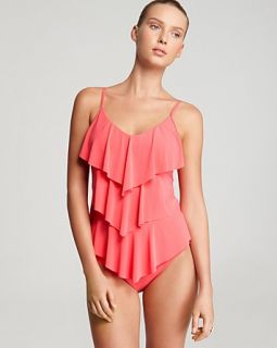 shirred swim bottom $ 68 00 $ 114 00 waves of ruffles cascade down