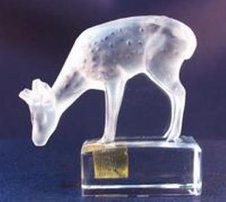 This is a beautiful Lalique French Crystal deer fawn figurine with a