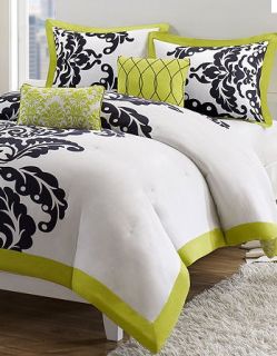 black and white palette is accented with bright pops of lime green