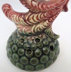 This auction features a beautiful Hull Pottery Exotic Bird form Flower
