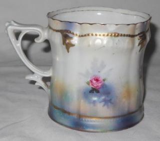 An Antique RS Prussia Floral Mug