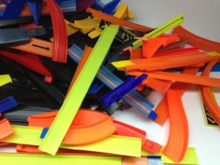 Huge LOT 140 + Hot Wheels Tracks and launchers vintage curves, loops