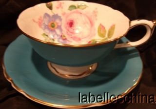 Paragon Teacup and Saucer HPT Roses Inside Aqua Outside and Gold Gilt