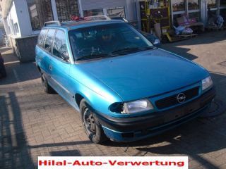 Opel Astra F 1,6 EZ94 Carav. Spannrolle Halter 90468139
