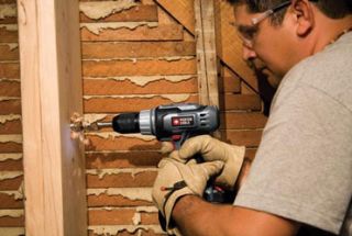Porter Cable’s PC180IDK 2 18 volt cordless NiCd impact driver has a